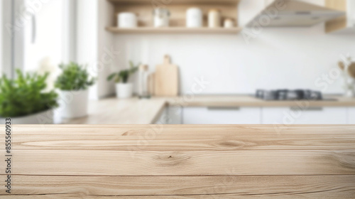 Empty wooden table and blurred white kitchen white wall background. Wood table top on blur kitchen counter	