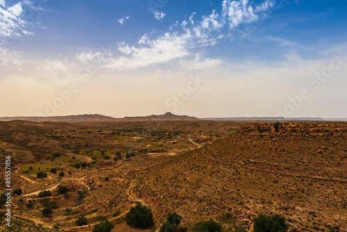 Tunisian landscape. View of the mountain range near Medenine in Tunisia. View taken from the heights of Ksar El Hallouf, former collective granary.  photo