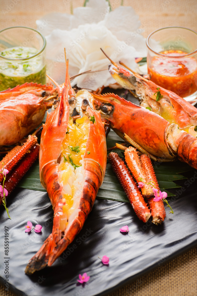 Grilled Prawn Decorated on a black plate Grilled Prawn Decorated on a black plate