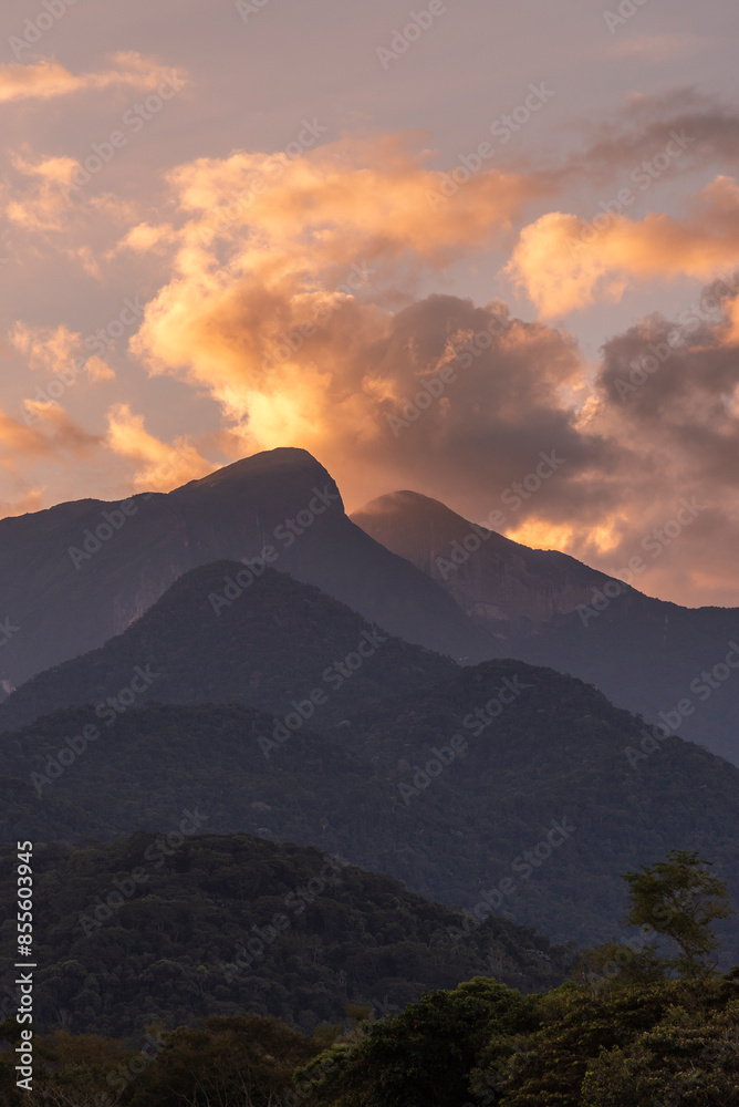 Beautiful layers of green rainforest mountains and sunset clouds Beautiful layers of green rainforest mountains and sunset clouds