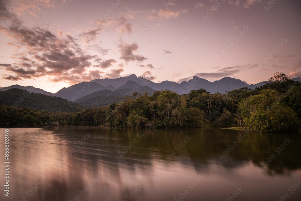 Fototapeta premium Beautiful lake with water reflections and mountains on the back