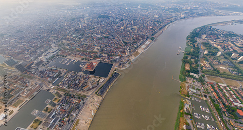 Antwerp, Belgium. Panorama of the city. River Scheldt (Escout). Summer morning. Aerial view photo