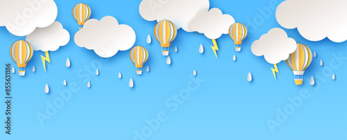 Hot air balloon flying on sky in the rain. Hot air balloon. Rainy season. paper cut and craft style. vector, illustration.