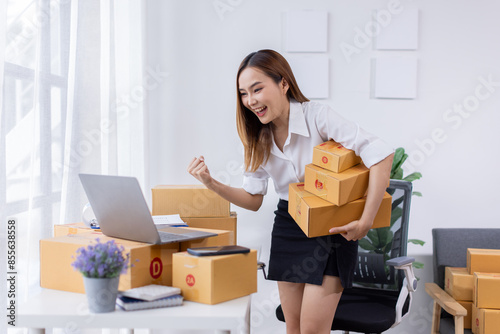 Pretty Asian sme business woman working Custom Ecommerce Packaging leading supplier of custom packaging. create a personalised experience, fast production SME and competitive pricing  © David