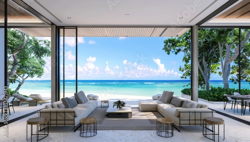 A large window overlooks the ocean, and a couch and coffee table are in the room © SH Design