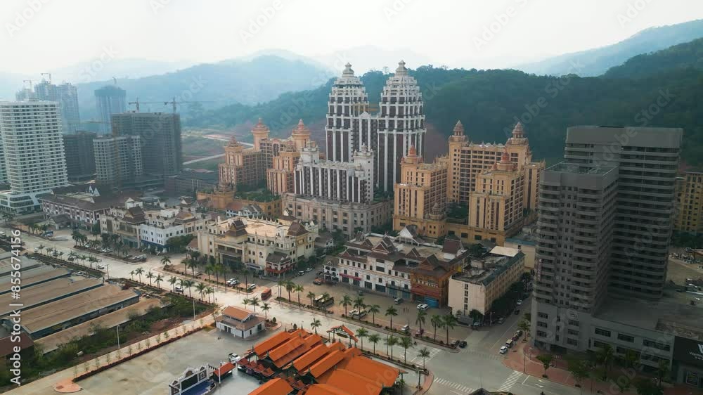 Aerial revealing shot of the famous Boten Skyline in Laos. Special Economic Zone between Laos and China for trade and foreign investment.