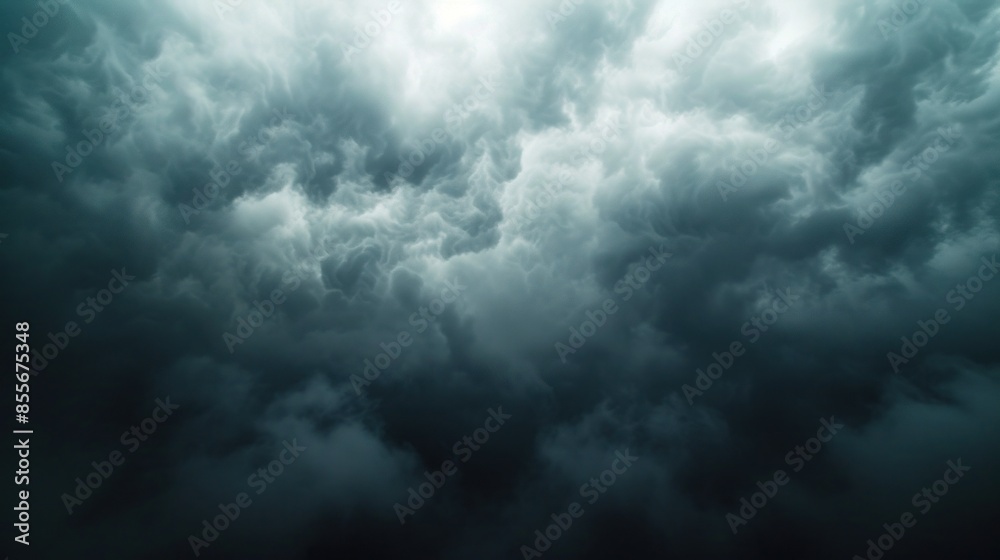 Obraz premium Dramatic Thunderstorm Clouds Illuminated by Lightning at Night