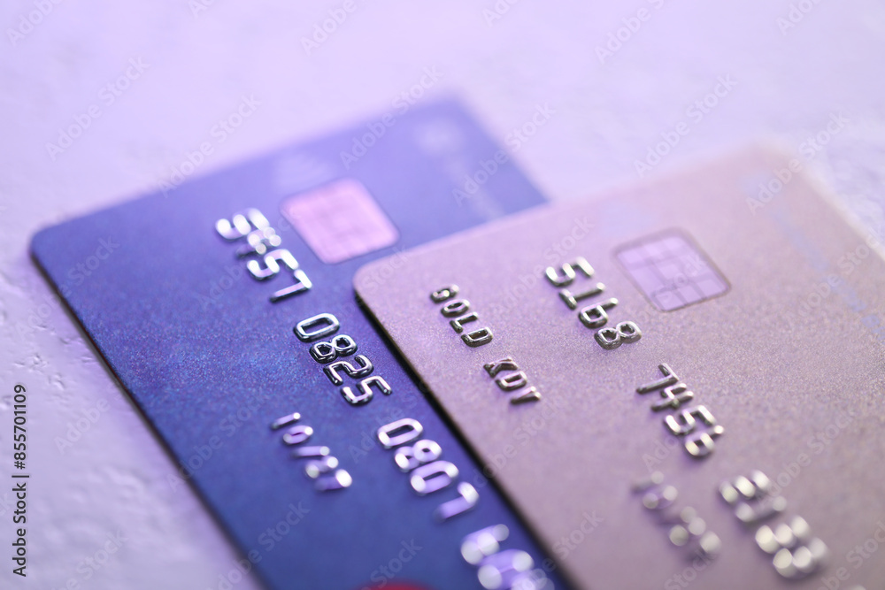 Plastic credit cards on table, closeup view. Color toned Plastic credit cards on table, closeup view. Color toned