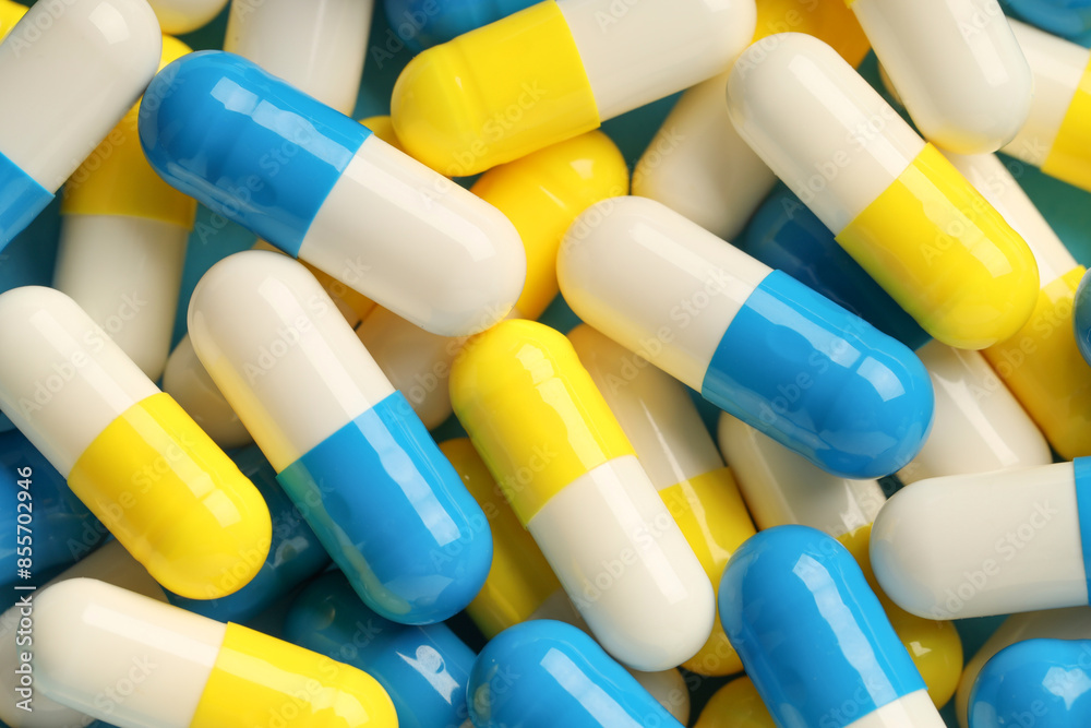 Many antibiotic pills as background, top view. Medicinal treatment Many antibiotic pills as background, top view. Medicinal treatment