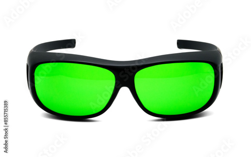Cool black sports sunglasses with green lenses or night vision glasses are glasses that are centered out on white isolated background.