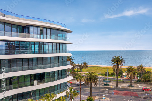 Wallpaper Mural Drone view of a building with the ocean behind it in St Kilda, Melbourne, Australia.  Torontodigital.ca