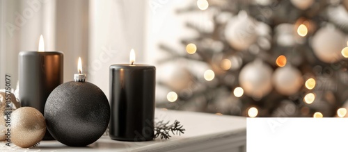 black burning candles with ...