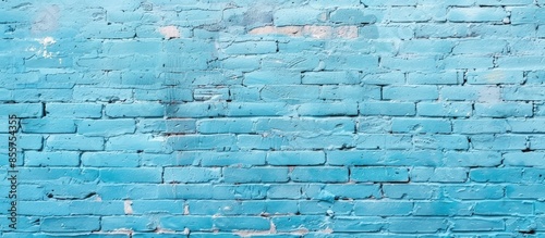 Brick wall painted with pale blue paint pastel calm tone texture background. Brickwork and stonework flooring interior rock old pattern clean concrete grid uneven bricks design stack backdrop