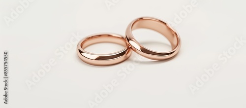 two rose gold wedding rings...