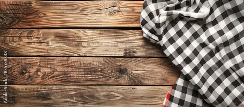 Checkered towel on wooden t...