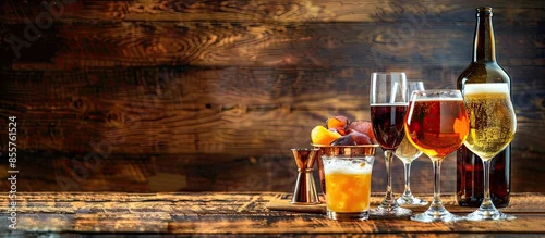 Obraz  z motywem Different alcohol drinks on table in bar. with copy space image. Place for adding text or design