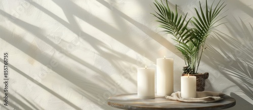 White candles on stand with...