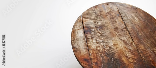 Round wooden table with four feet in white background. with copy space image. Place for adding text or design photo