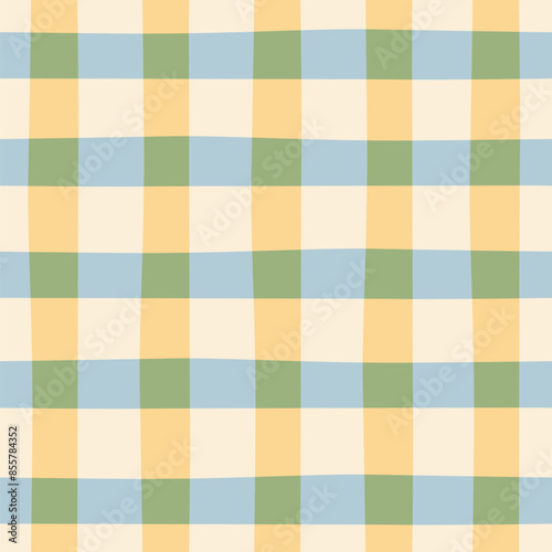 Gingham seamless vector pattern. Tartan check for tablecloths, napkins, clothes, packaging, for the Easter holiday. Cozy cute childish background in pastel pink beige blue palette