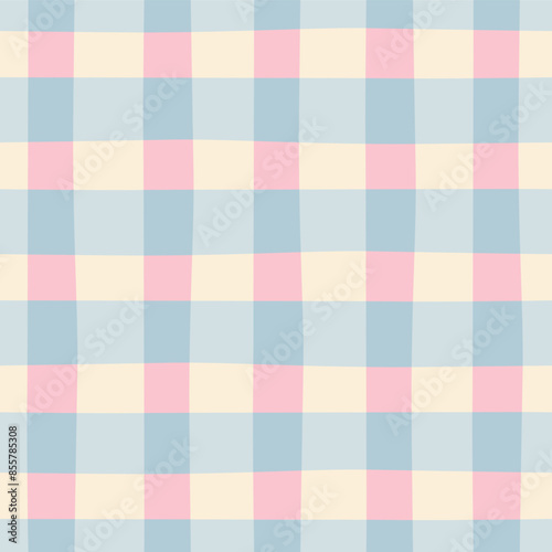 Gingham seamless vector pattern. Tartan check for tablecloths, napkins, clothes, packaging, for the Easter holiday. Cozy cute childish background in pastel pink beige blue palette