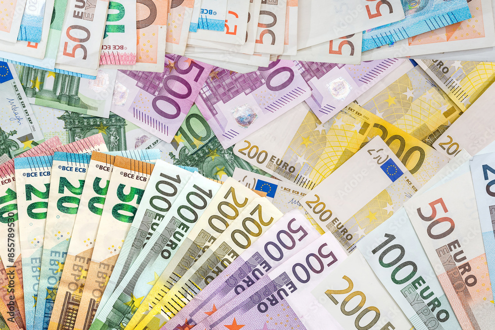 Lot of paper euro cash as finance background, top view Lot of paper euro cash as finance background, top view