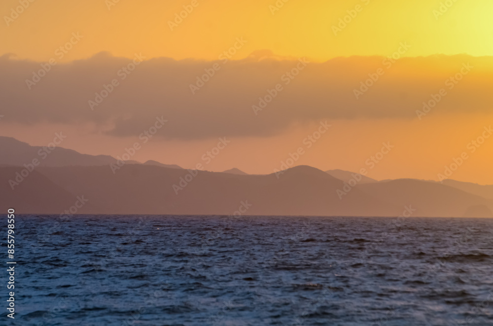Rock formations near the beach with soft sunset light Rock formations near the beach with soft sunset light