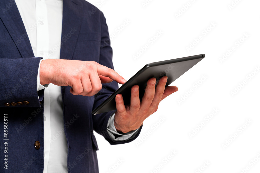Businessman in a suit using a digital tablet, photographed closeup with a white background, concept of technology in business Businessman in a suit using a digital tablet, photographed closeup with a white background, concept of technology in business