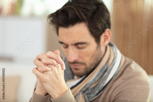attractive young guy asking for a favor photo