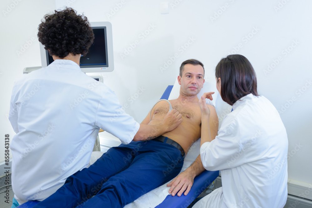 man is laying in bed for blood donation man is laying in bed for blood donation