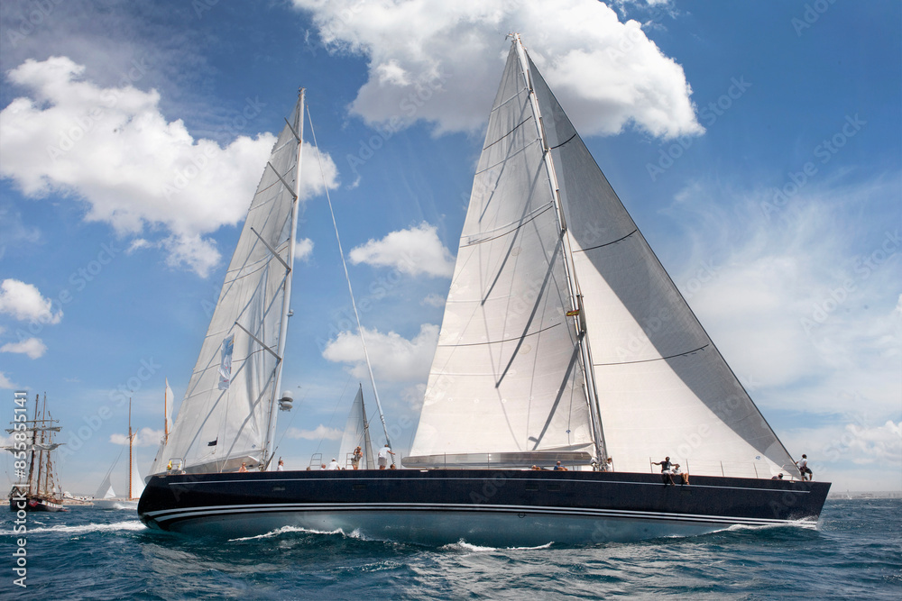 Sailing yacht at Mediterranean Sea. Sail. Boat. Palma de Mallorca. Super sailing yacht. Full sail. Sailing yacht at Mediterranean Sea. Sail. Boat. Palma de Mallorca. Super sailing yacht. Full sail.