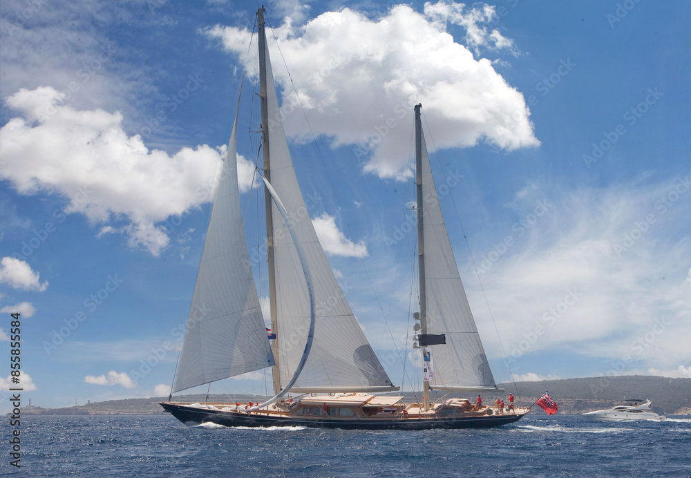 Sailing yacht at Mediterranean Sea. Sail. Boat. Palma de Mallorca. Super sailing yacht. Full sail. Sailing yacht at Mediterranean Sea. Sail. Boat. Palma de Mallorca. Super sailing yacht. Full sail.