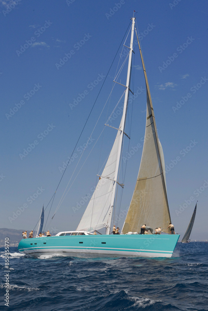 Sailing yacht at Mediterranean Sea. Sail. Boat. Palma de Mallorca. Super sailing yacht. Full sail. Sailing yacht at Mediterranean Sea. Sail. Boat. Palma de Mallorca. Super sailing yacht. Full sail.