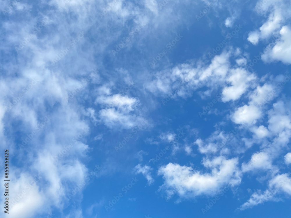 Tranquil Blue Sky with Soft Clouds - Serene Nature Background Tranquil Blue Sky with Soft Clouds - Serene Nature Background