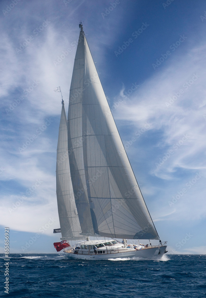 Sailing yacht at Mediterranean Sea. Sail. Boat. Palma de Mallorca. Super sailing yacht. Full sail. Sailing yacht at Mediterranean Sea. Sail. Boat. Palma de Mallorca. Super sailing yacht. Full sail.
