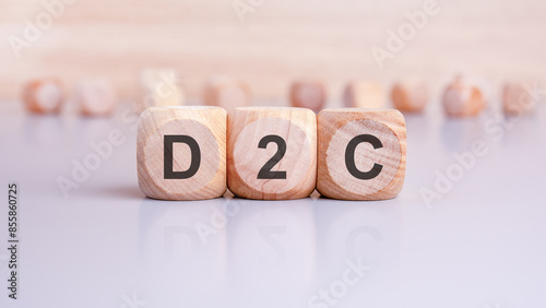 the acronym D2C is written on wooden cubes