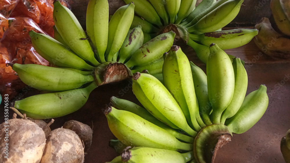 Green banana on the market display Green banana on the market display