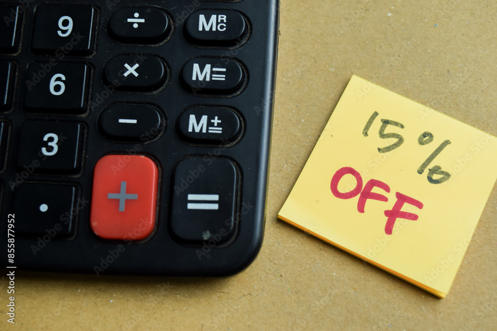Concept of 15 percent Off write on sticky notes isolated on Wooden Table. Concept of 15 percent Off write on sticky notes isolated on Wooden Table.