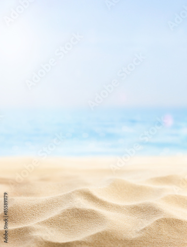 Fototapeta Naklejka Na Ścianę i Meble -  vertical summer background of beach sand and sea