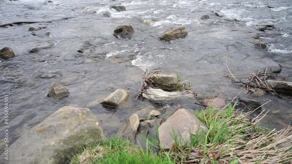 River water flow. Flowing water in the river.
River water flow. Flowing water in the river.