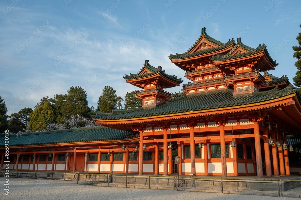 Traditional Japanese Heian-jingu Shrine with intricate wooden architecture and green rooftops Traditional Japanese Heian-jingu Shrine with intricate wooden architecture and green rooftops