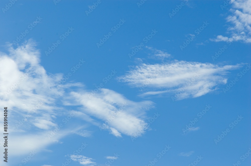 Thick clouds in summer blue sky. Cloudy bright beauty in the sun, bright and calm summer air background. Thick clouds in summer blue sky. Cloudy bright beauty in the sun, bright and calm summer air background.