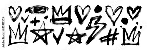 Collection of scribble doodle shapes with dry brush texture. Hand drawn crowns, stars, eye, lightning and hearts. Brush drawn graffiti and grunge style elements. Vector shapes in punk style.