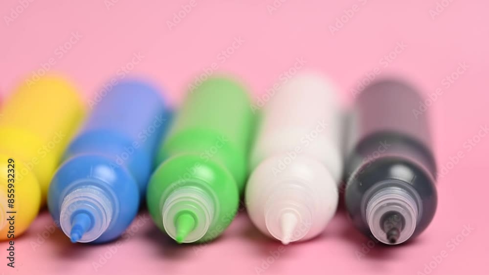bottles with colored paint close-up bottles with colored paint close-up