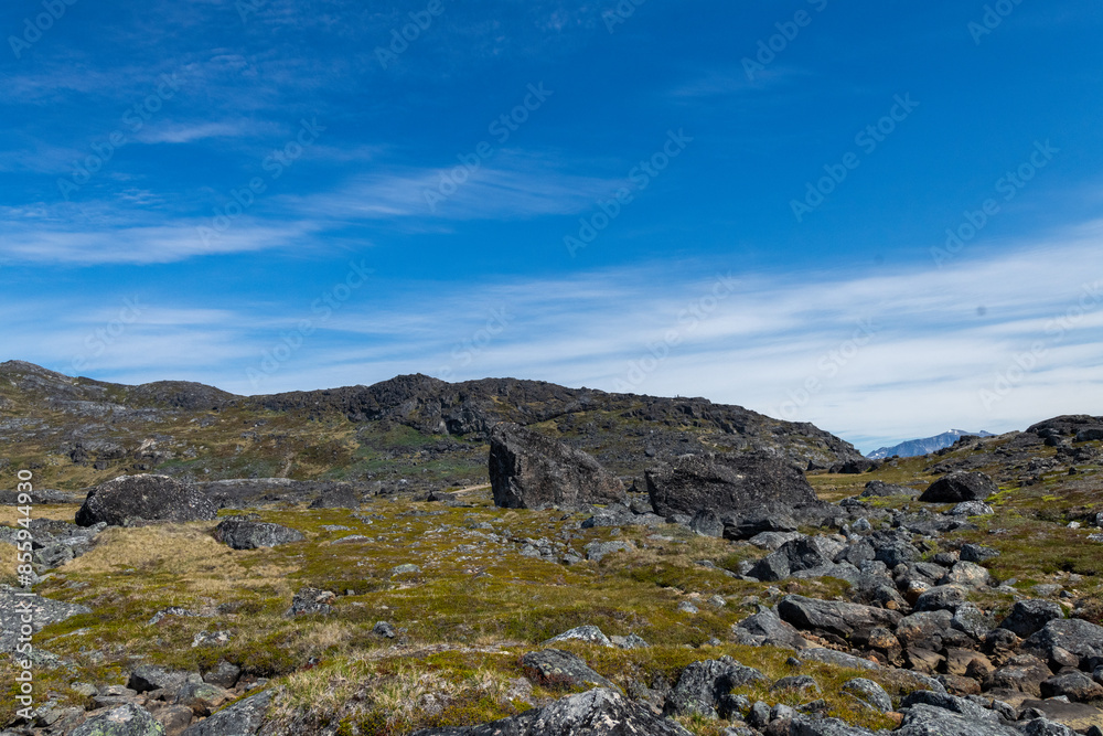 Greenland Nanortalik lava stones volcanic mountain fjord arctic landscape on a sunny day Greenland Nanortalik lava stones volcanic mountain fjord arctic landscape on a sunny day