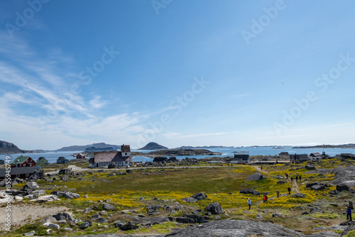 Greenland Nanortalik north sea landscape seascape marina surrounded by fjord mountain peaks on a sunny day