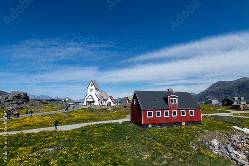 Greenland Nanortalik town landscape with traditional colourful houses on a sunny day