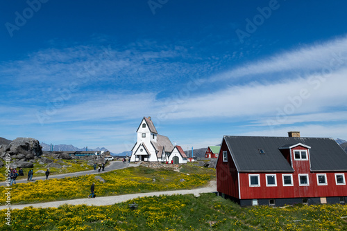 Greenland Nanortalik town landscape with traditional colourful houses on a sunny day