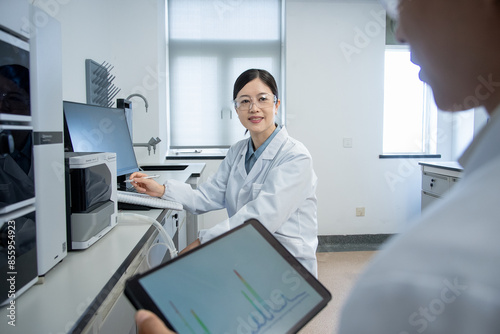 Wallpaper Mural doctor working with tablet in lab Torontodigital.ca