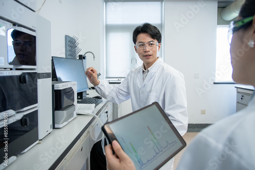 doctor coworking on computer in lab