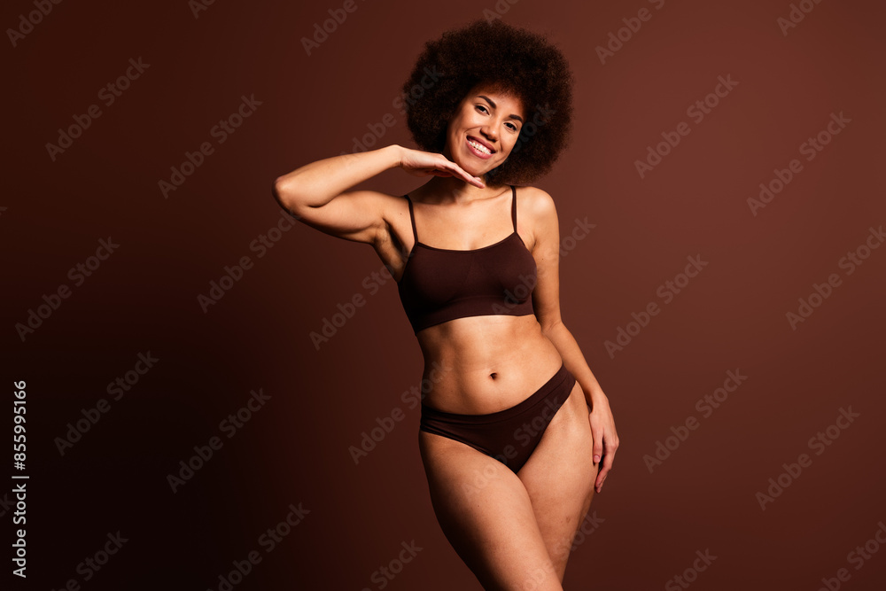 Obraz premium Photo of shiny sweet lady underwear lingerie enjoying body positive emtpy space isolated brown color background